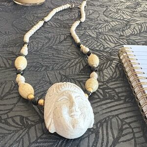 Elegant Beige and Black Beaded Necklace carved face of poss budda (estate sale)